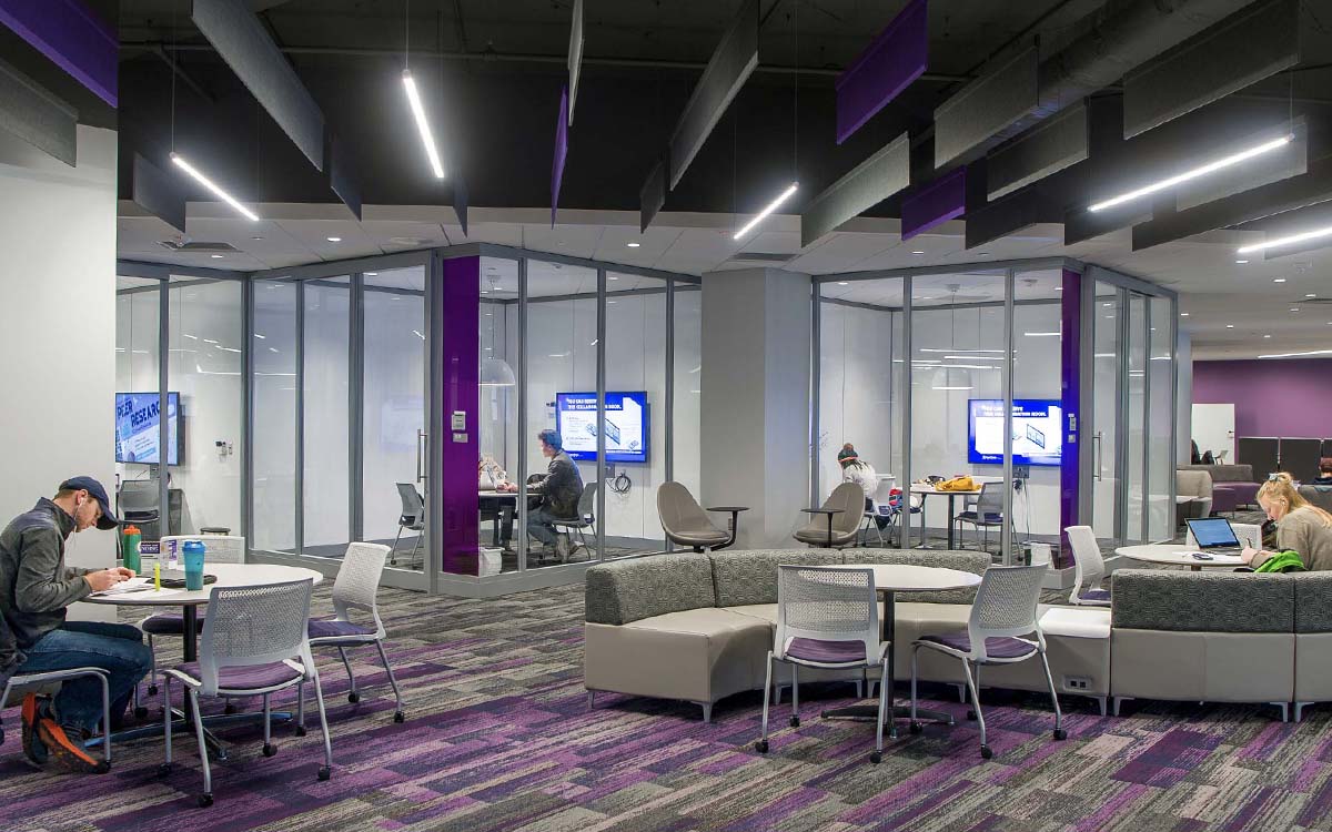 Students using study spaces in Hale Library.