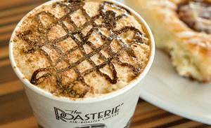 Cup of coffee and a cinnamon roll.