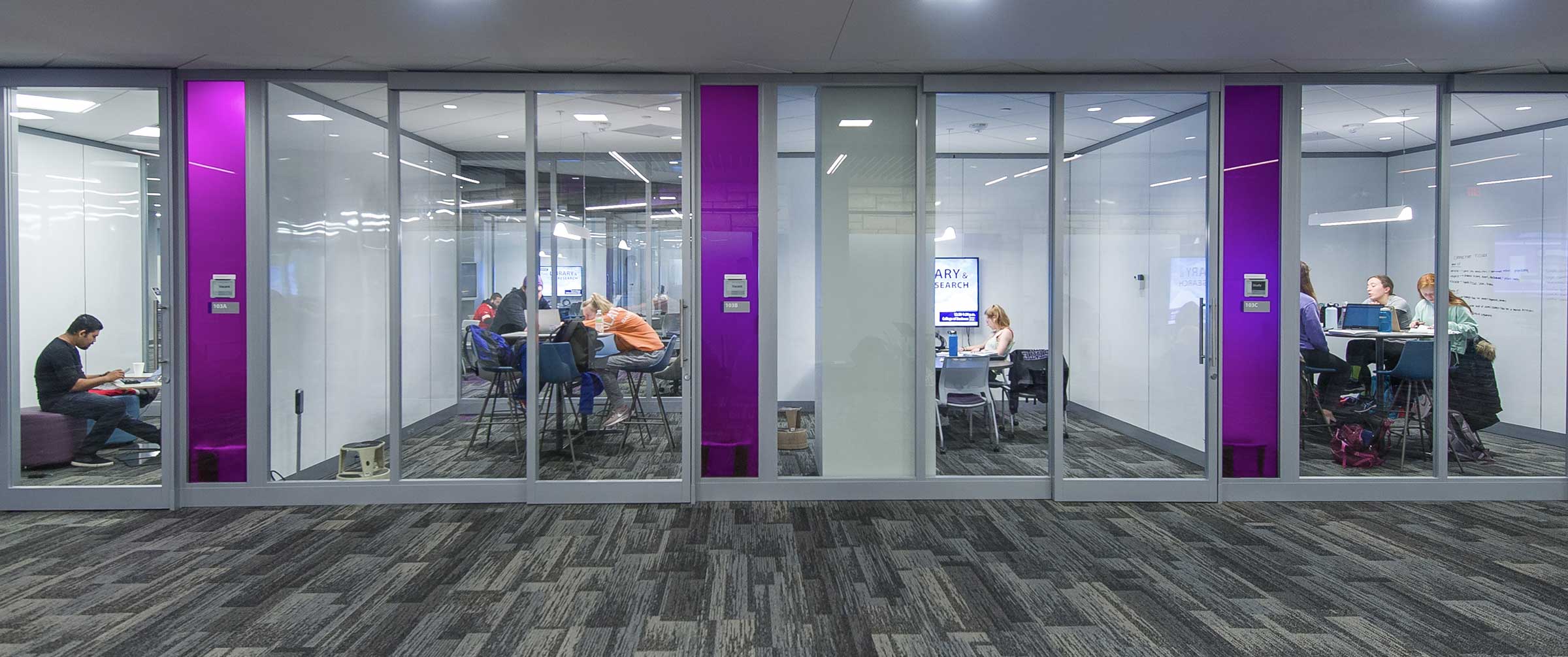Students in collaboration rooms