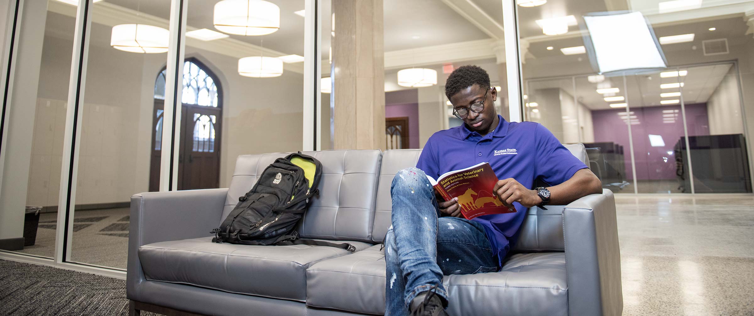 Graduate student in Hale Library study room on third floor
